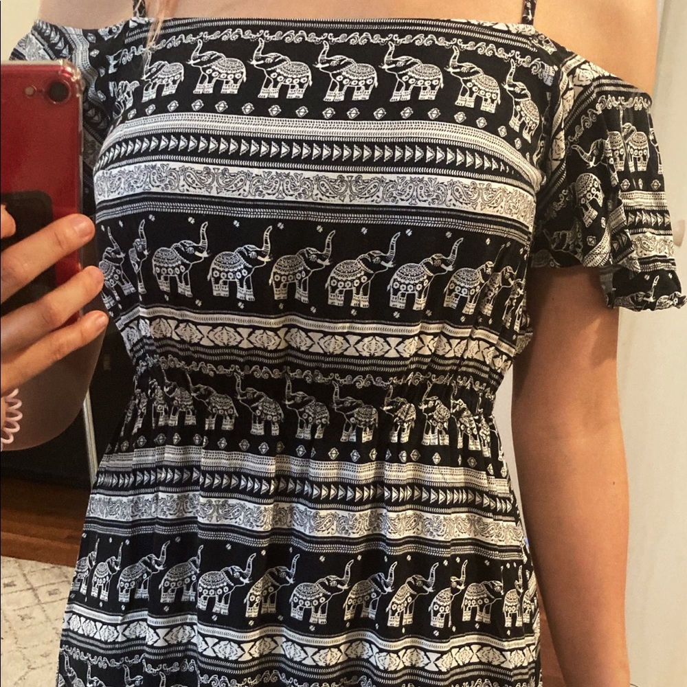 Black and white elefant short dress.